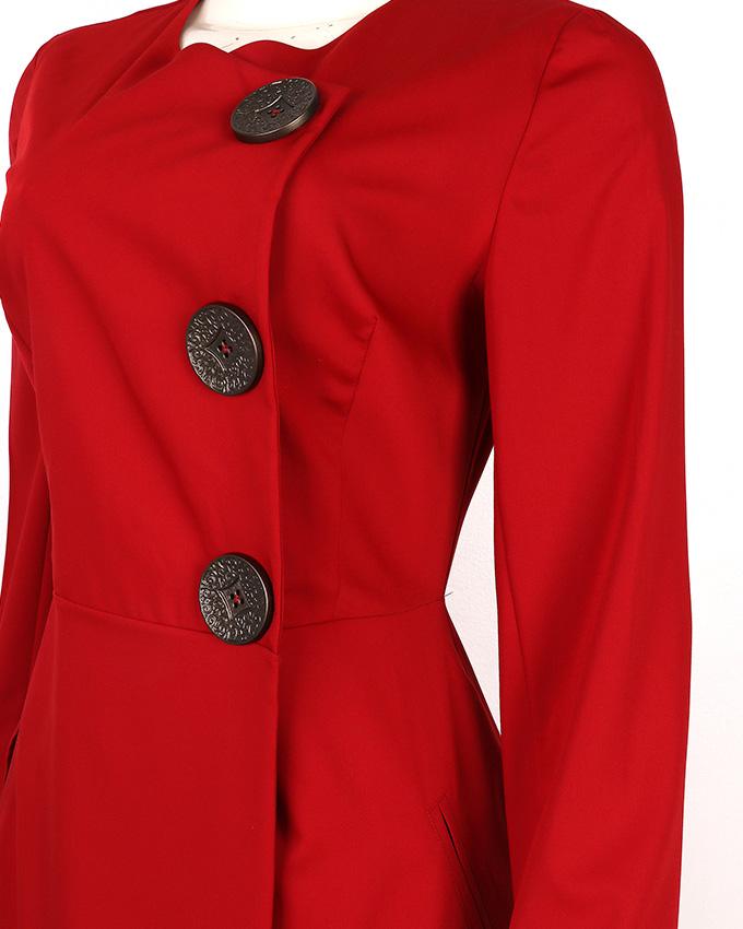 Side view of midi wrap dress showing gold button detail